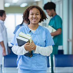 Nurse student with textbooks